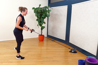 tephanie setting up for a HupSix cardio workout class at home.