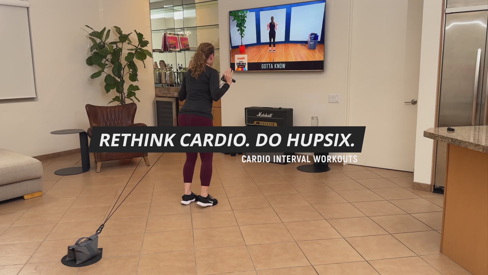 Load video: women doing HupSix HIIT cardio workout at home in living room. Best On Demand Cardio Workout